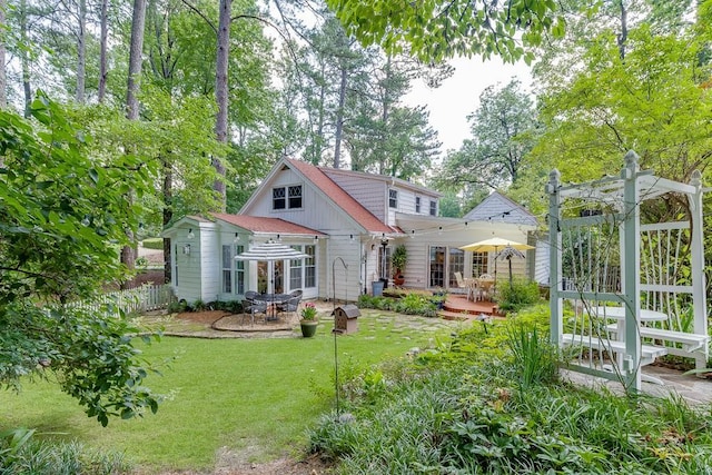 3219 Parkridge Cres, Chamblee, GA 30341 - rear view of property featuring a wooden deck, a patio, and outdoor dining space