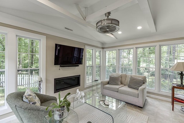 3219 Parkridge Cres, Chamblee, GA 30341 - living area featuring light tile patterned flooring, a glass covered fireplace, and recessed lighting