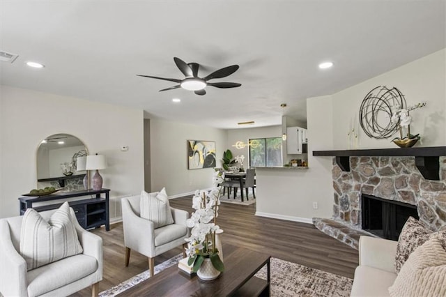 4912 Bayside Ct, Stone Mountain, GA 30088 - living area with a ceiling fan, wood finished floors, and a fireplace