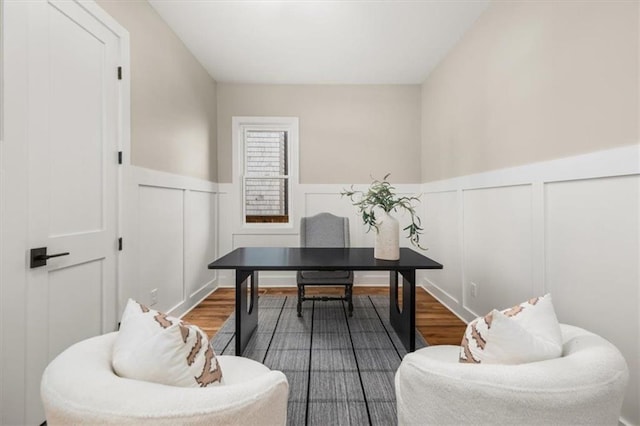 2018 Presley Way NE, Atlanta, GA 30317 - home office with a decorative wall, a wainscoted wall, and dark wood-style flooring