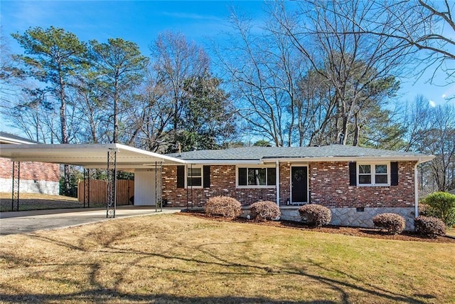 ranch-style home with a carport and a front lawn