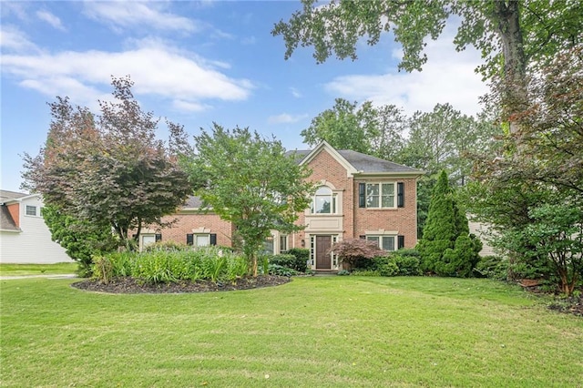 10865 Glenhurst Pass, Duluth, GA 30097 - view of front of property with brick siding and a front lawn