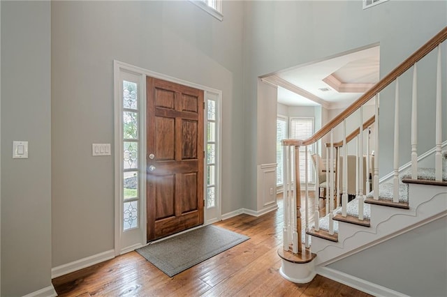 10865 Glenhurst Pass, Duluth, GA 30097 - foyer entrance featuring hardwood / wood-style flooring, stairway, and ornamental molding