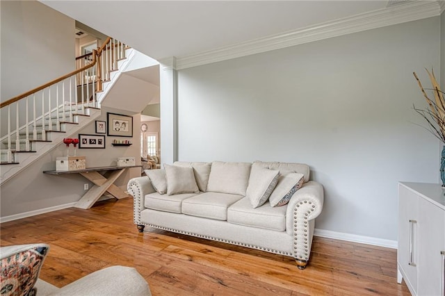 10865 Glenhurst Pass, Duluth, GA 30097 - living room featuring ornamental molding, stairs, and wood finished floors