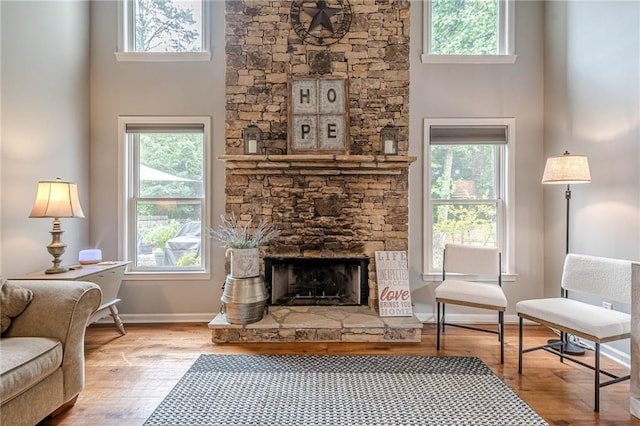 10865 Glenhurst Pass, Duluth, GA 30097 - living area with plenty of natural light and a fireplace