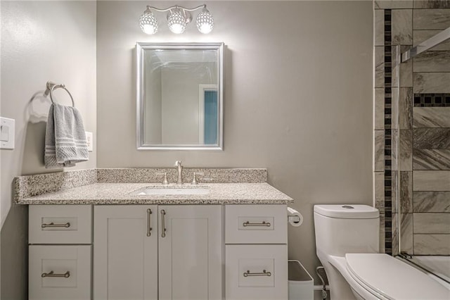 10865 Glenhurst Pass, Duluth, GA 30097 - bathroom featuring vanity and a tile shower