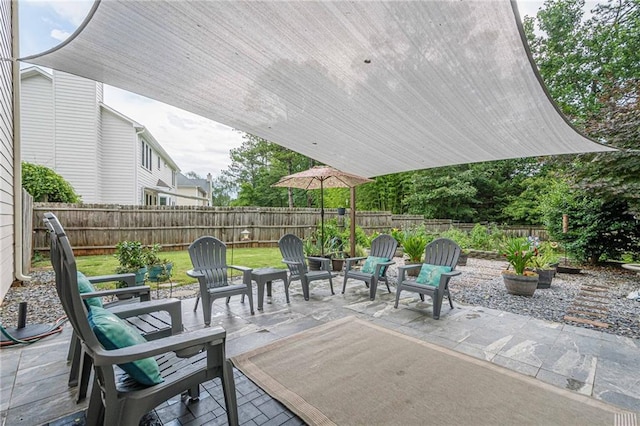 10865 Glenhurst Pass, Duluth, GA 30097 - fenced backyard with a patio