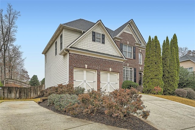 view of front of property with a garage