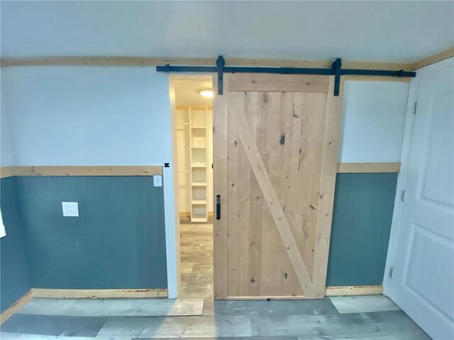 spare room featuring wood-type flooring