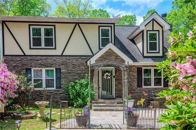 21 Basin Ct, Jasper, GA 30143 - english style home featuring stone siding, stucco siding, and a patio area