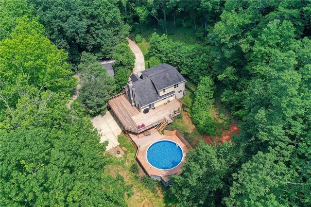 21 Basin Ct, Jasper, GA 30143 - tudor-style house with stucco siding, stone siding, and a patio