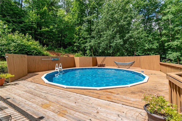 21 Basin Ct, Jasper, GA 30143 - view of swimming pool with a deck