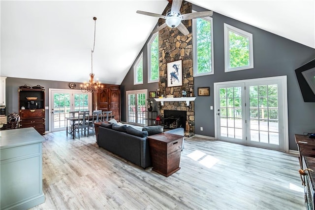 21 Basin Ct, Jasper, GA 30143 - living area featuring high vaulted ceiling, ceiling fan, light wood-type flooring, a chandelier, and a fireplace
