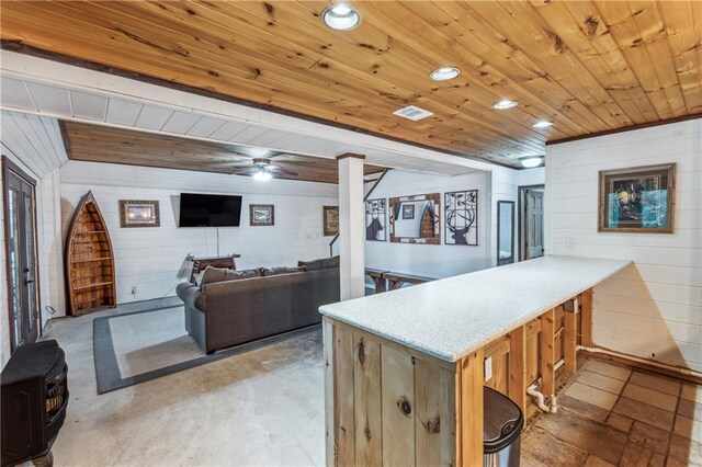 21 Basin Ct, Jasper, GA 30143 - bedroom with unfinished concrete floors, wooden ceiling, a spacious closet, wooden walls, and a closet