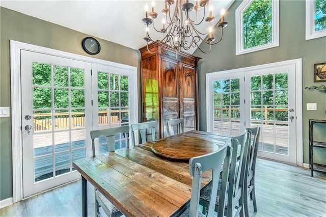 21 Basin Ct, Jasper, GA 30143 - dining room with a chandelier, healthy amount of natural light, and light wood-type flooring