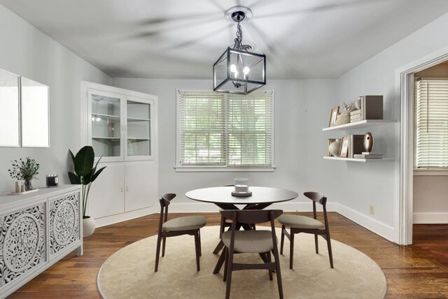 dining room with dark wood-type flooring