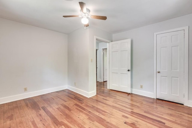 unfurnished bedroom featuring light hardwood / wood-style floors and ceiling fan