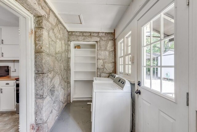 washroom featuring washer and clothes dryer