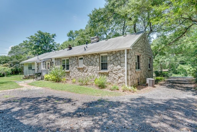 ranch-style house featuring central AC