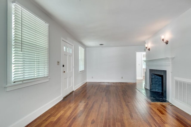 foyer with dark hardwood / wood-style flooring