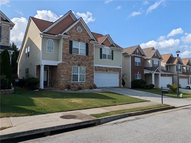 view of front of property featuring an attached garage, a front yard, a residential view, stone siding, and driveway