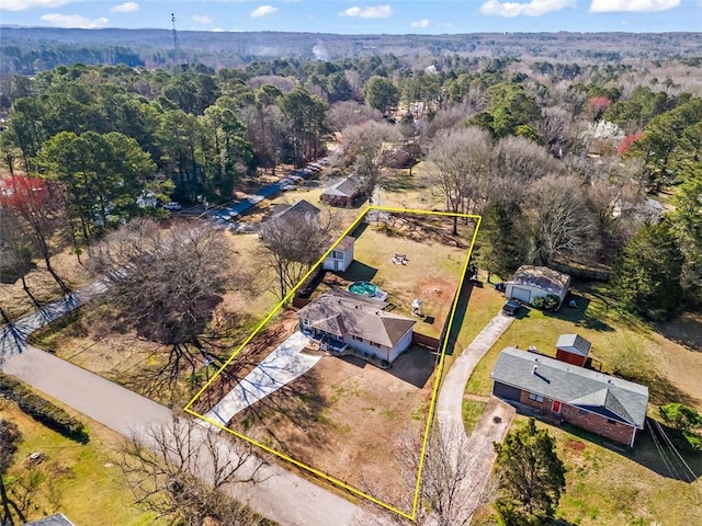 drone / aerial view with a forest view