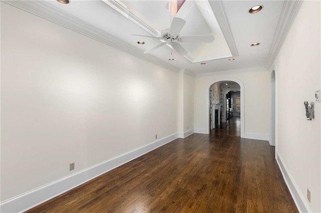 unfurnished room with ceiling fan, crown molding, and dark hardwood / wood-style flooring