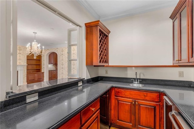 kitchen with crown molding, hanging light fixtures, sink, dishwasher, and a chandelier