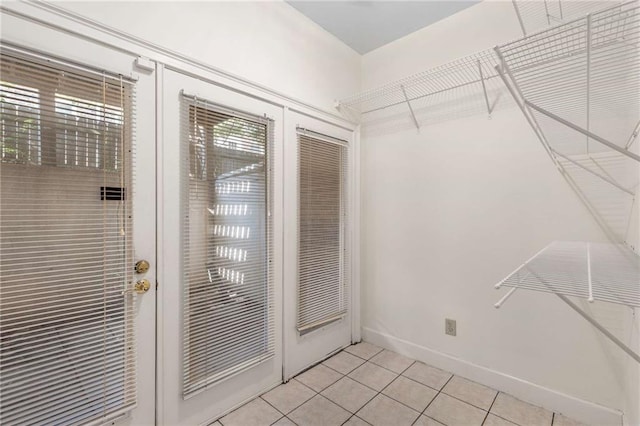 entryway featuring light tile patterned floors