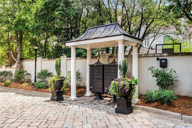 view of patio featuring a mail area