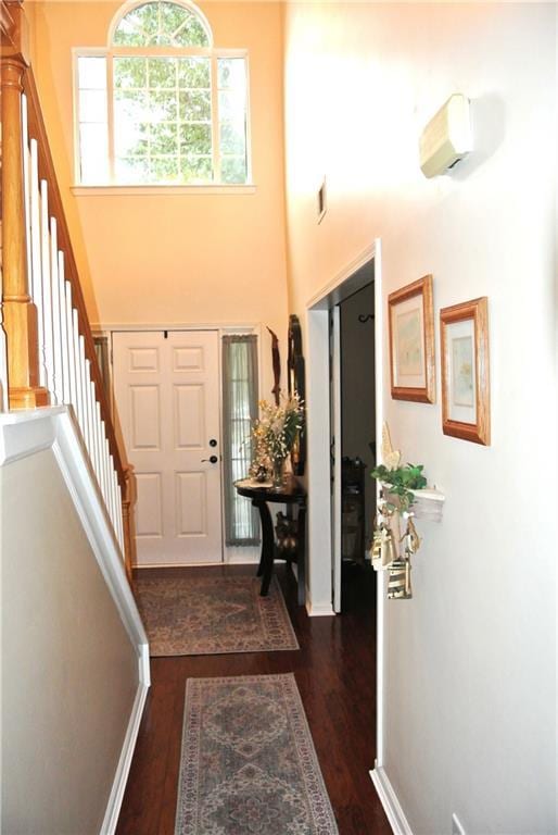 3824 Smith Creek Ct, Buford, GA 30519 - foyer with stairs, dark wood-style floors, and a towering ceiling
