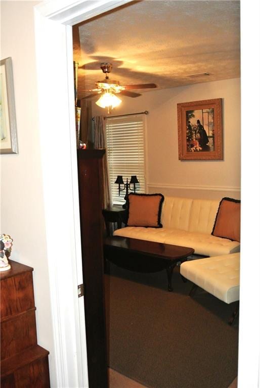 3824 Smith Creek Ct, Buford, GA 30519 - living area with a ceiling fan and a wainscoted wall