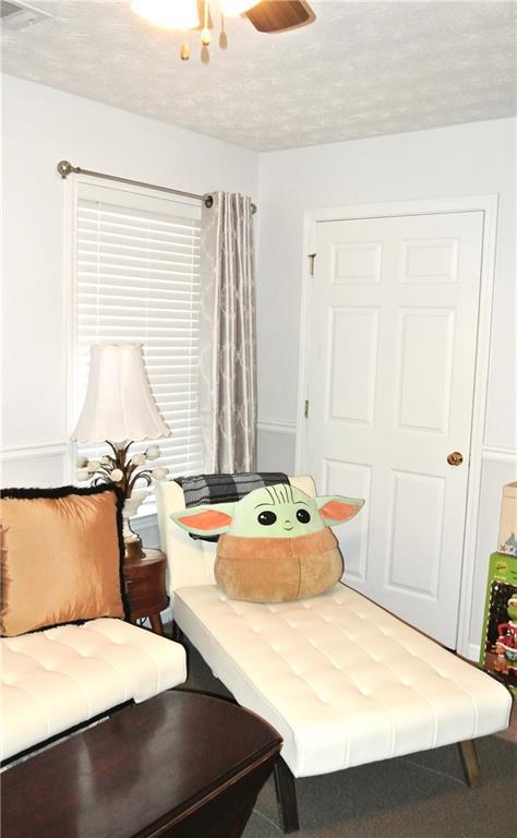 3824 Smith Creek Ct, Buford, GA 30519 - bedroom featuring a textured ceiling