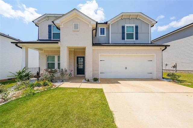 view of front of house with concrete driveway, an attached garage, a front lawn, a porch, and board and batten siding