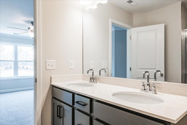 full bathroom with visible vents, a sink, a ceiling fan, and double vanity
