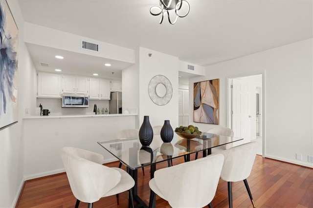 dining room featuring dark hardwood / wood-style floors