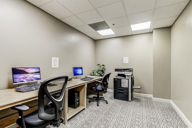 office featuring carpet and a drop ceiling