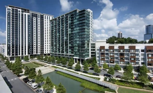 view of building exterior featuring a water view