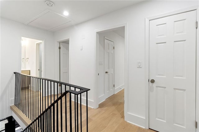 hallway with light wood-type flooring