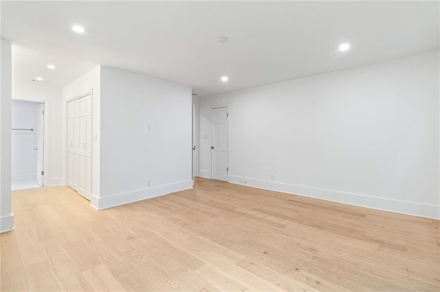 empty room with light wood-type flooring