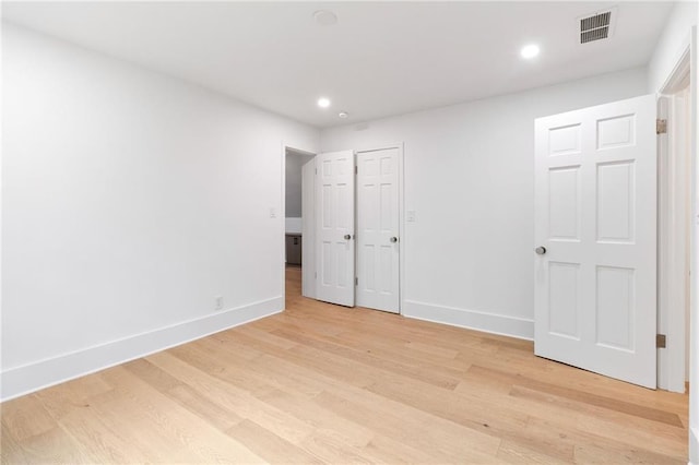 unfurnished bedroom featuring light hardwood / wood-style flooring