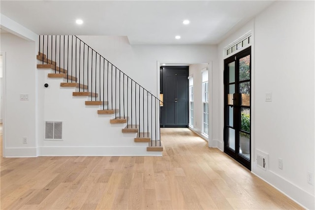 foyer entrance featuring light hardwood / wood-style flooring