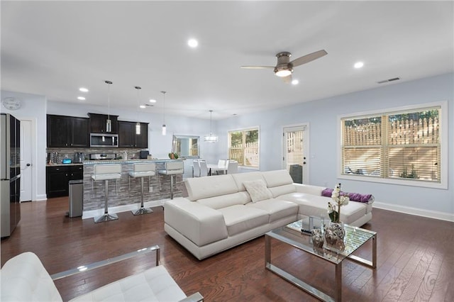 2040 Harvest Ridge Cir, Buford, GA 30519 - living room with a ceiling fan, dark wood finished floors, recessed lighting, and baseboards