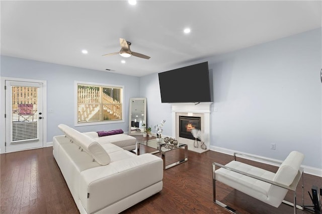 2040 Harvest Ridge Cir, Buford, GA 30519 - living area featuring a ceiling fan, a fireplace with flush hearth, wood finished floors, recessed lighting, and baseboards