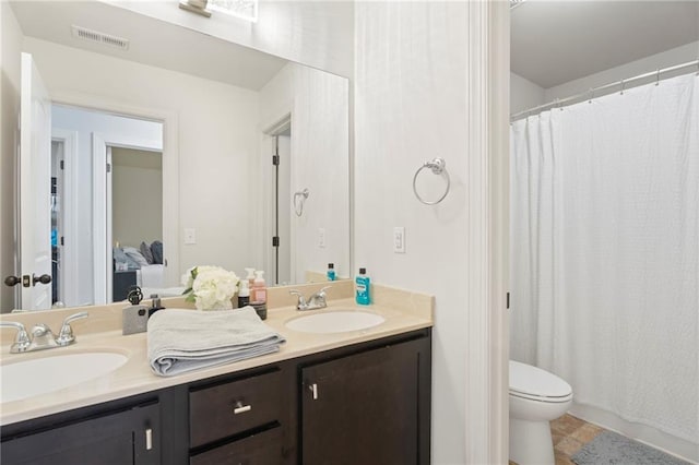 2040 Harvest Ridge Cir, Buford, GA 30519 - full bathroom with double vanity, toilet, and curtained shower