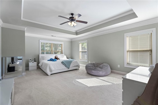 2040 Harvest Ridge Cir, Buford, GA 30519 - bedroom featuring a tray ceiling, light colored carpet, crown molding, baseboards, and ceiling fan