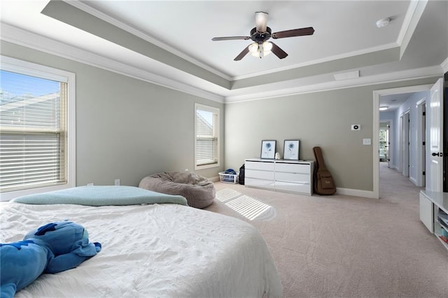 2040 Harvest Ridge Cir, Buford, GA 30519 - bedroom with a raised ceiling, light colored carpet, crown molding, ceiling fan, and baseboards