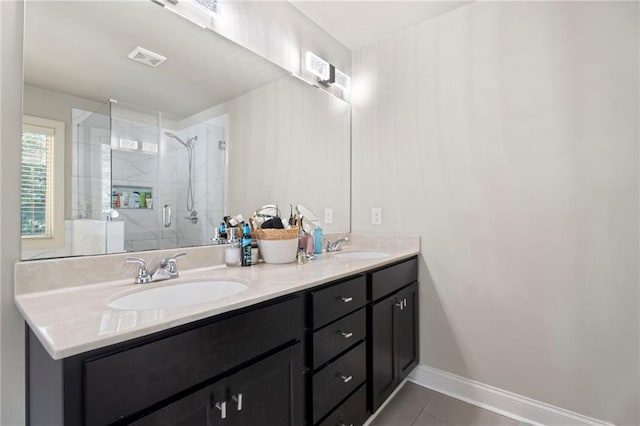 2040 Harvest Ridge Cir, Buford, GA 30519 - full bath with double vanity, a shower stall, tile patterned flooring, and baseboards