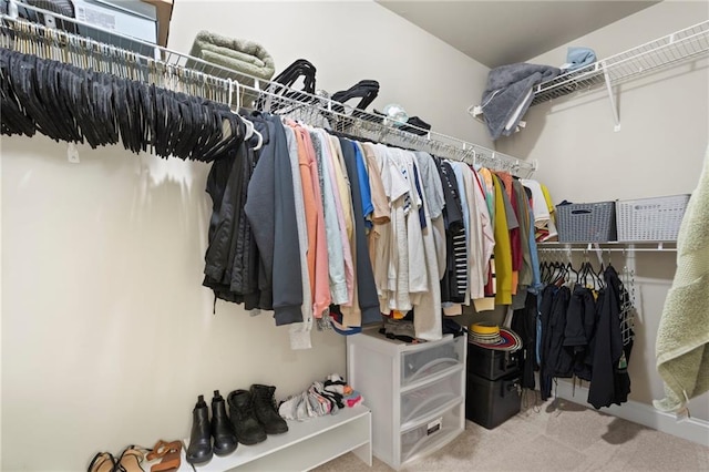 2040 Harvest Ridge Cir, Buford, GA 30519 - walk in closet featuring carpet