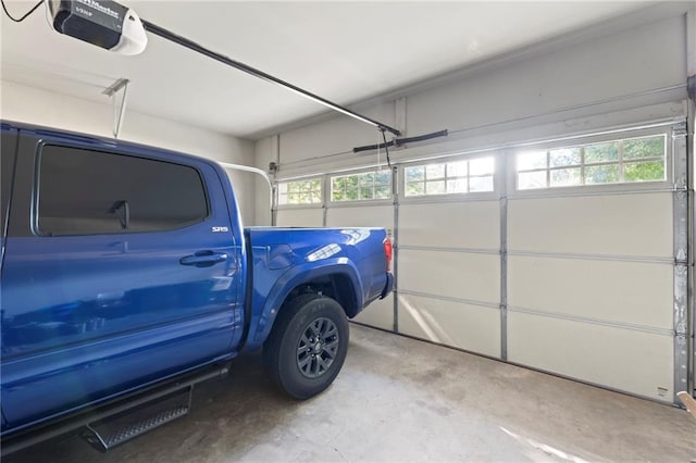2040 Harvest Ridge Cir, Buford, GA 30519 - garage featuring a garage door opener